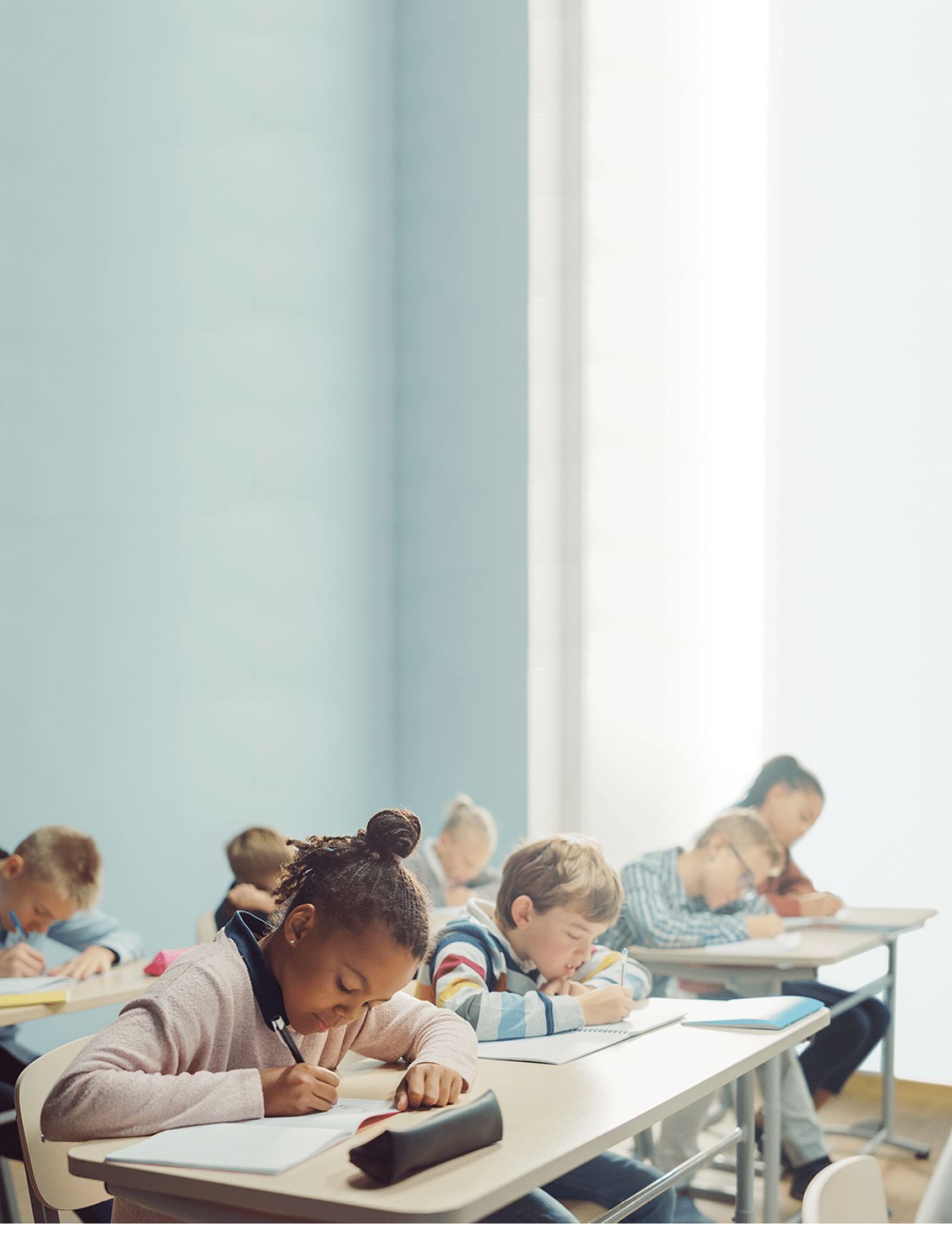 Elementary Classroom of Diverse Bright Children Listening Attentively to their Teacher Giving Lesson. Brilliant Young Kids in School Writing in Exercise Notebooks, Taking Test.